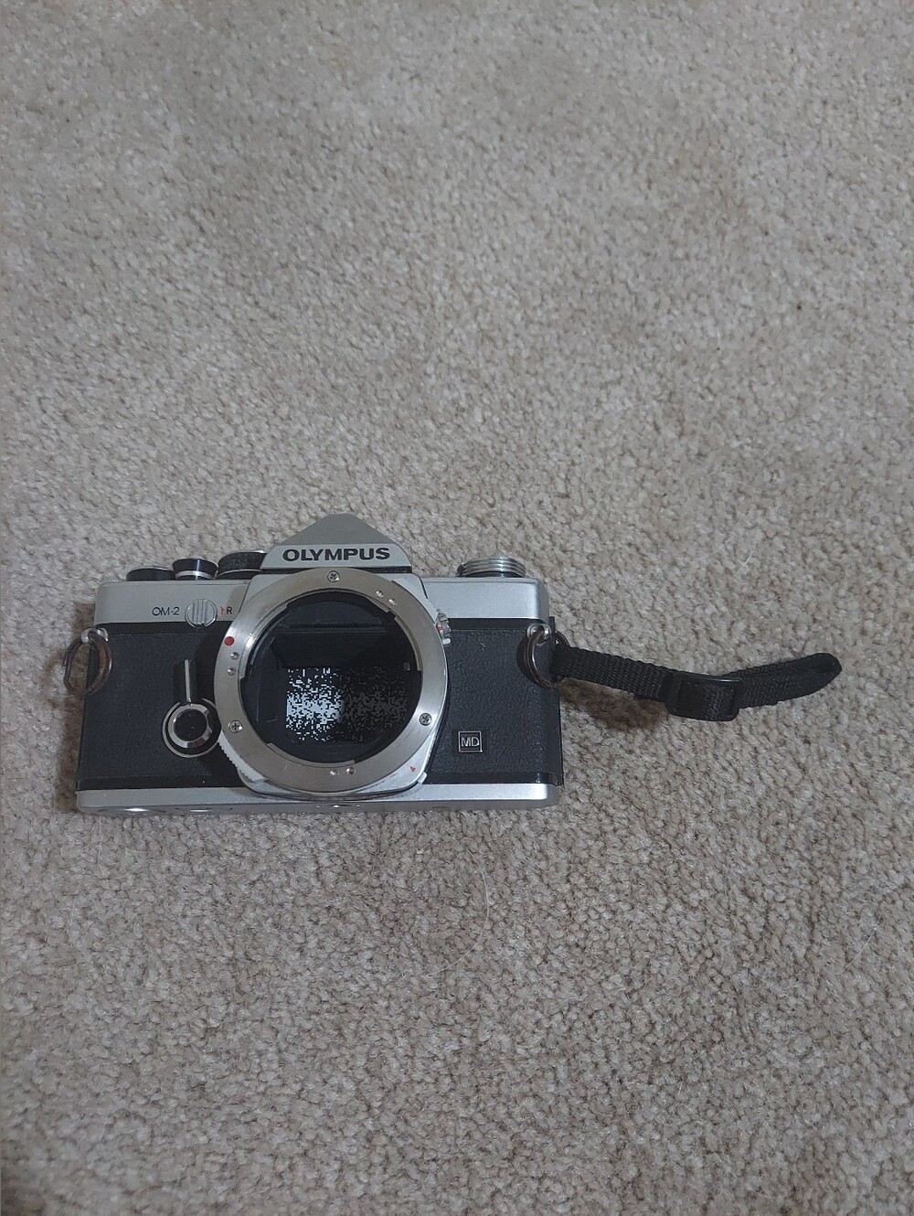 Olympus OM-2 Silver and Black 35mm Film SLR Camera Body with Wrist Strap